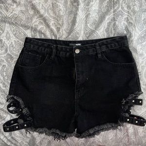 These are After Dark jean shorts in black